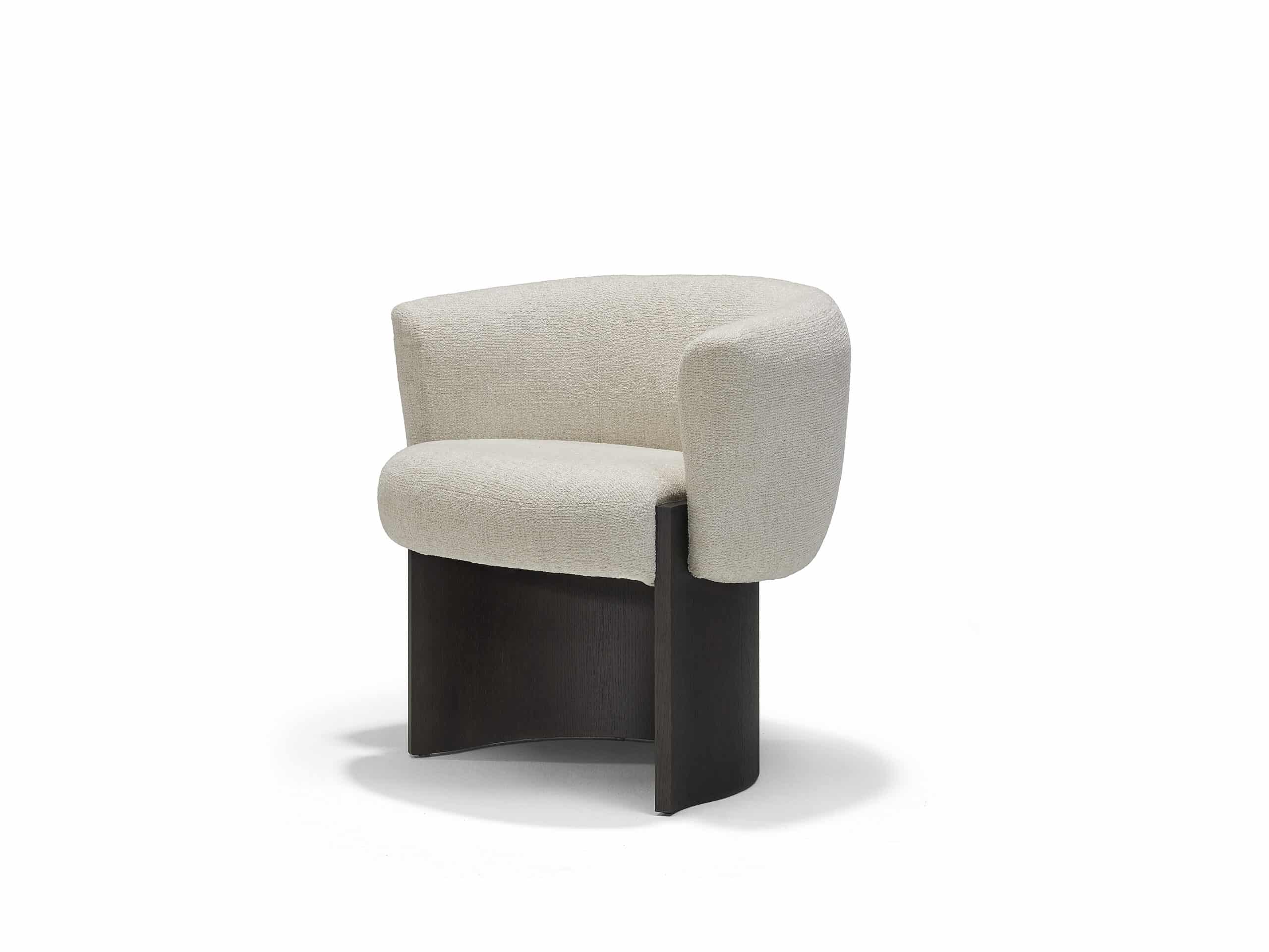 The Linteloo Claude dining chair, with a C-shaped oak veneer base and an upholstered seat and back.